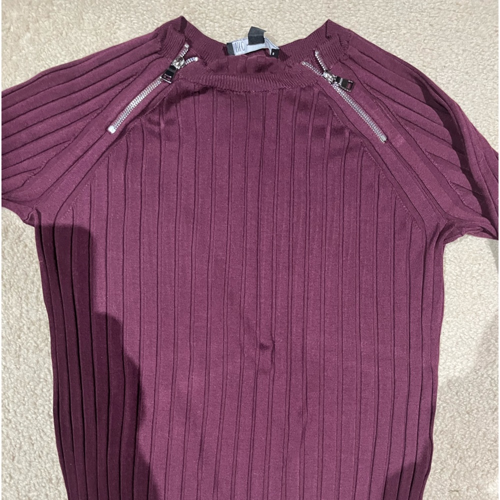 Sweather by INC with two zippers by collar bone.  Color is a pretty wine shade